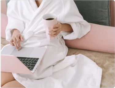 Person on laptop creating a professional email account with a custom business domain name.