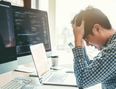 Man knowing he must buy website scanner, but not yet aware that it includes free backup.